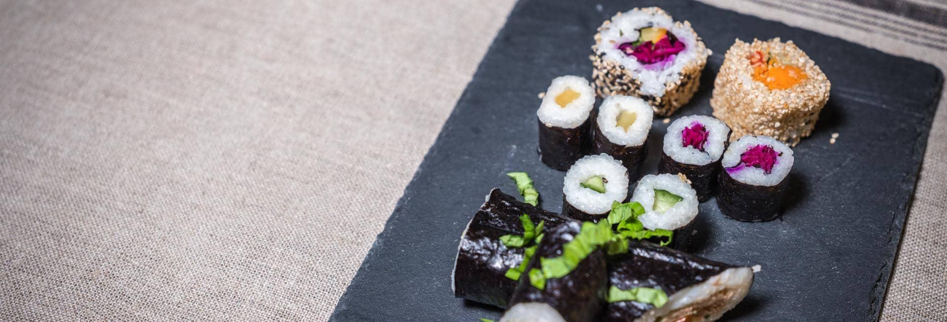 Sushi on slate serving platter