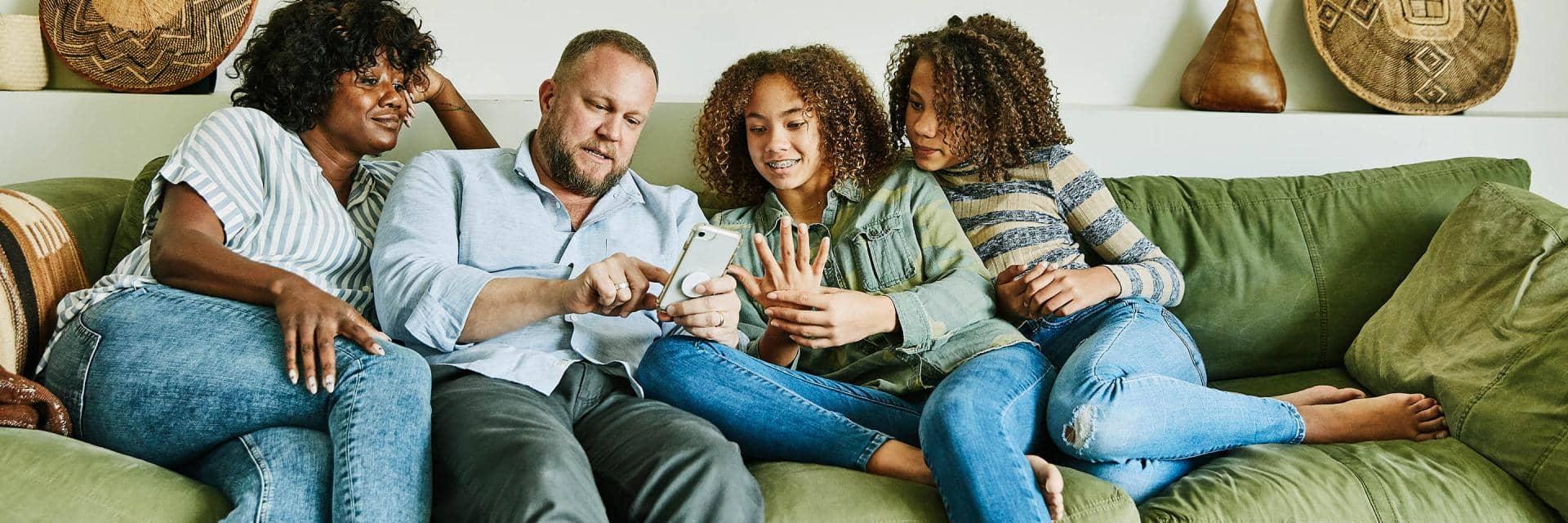 Family enjoying tech entertainment