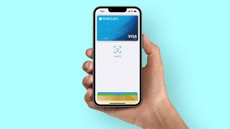 A phone screen using Apple Pay with a Barclays card to make a payment.